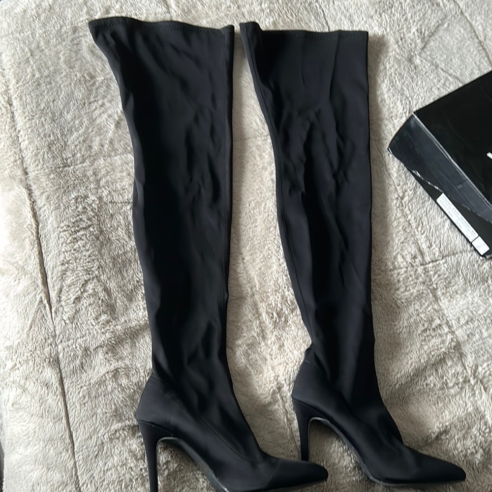 From Fashion nova … All black thigh high boot  size 10